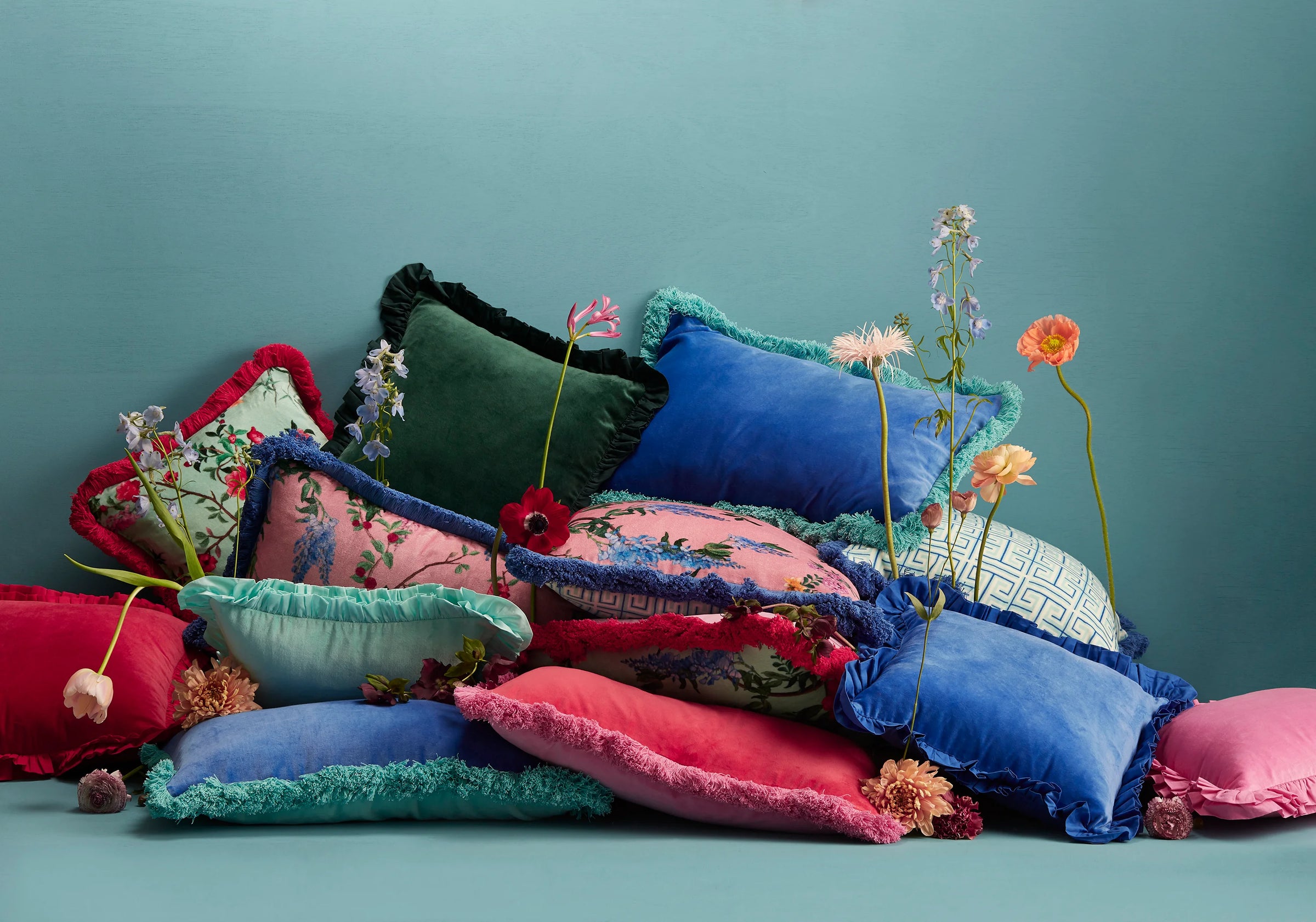 Maison Splendid selection of printed and plain velvet cushions in bright colours