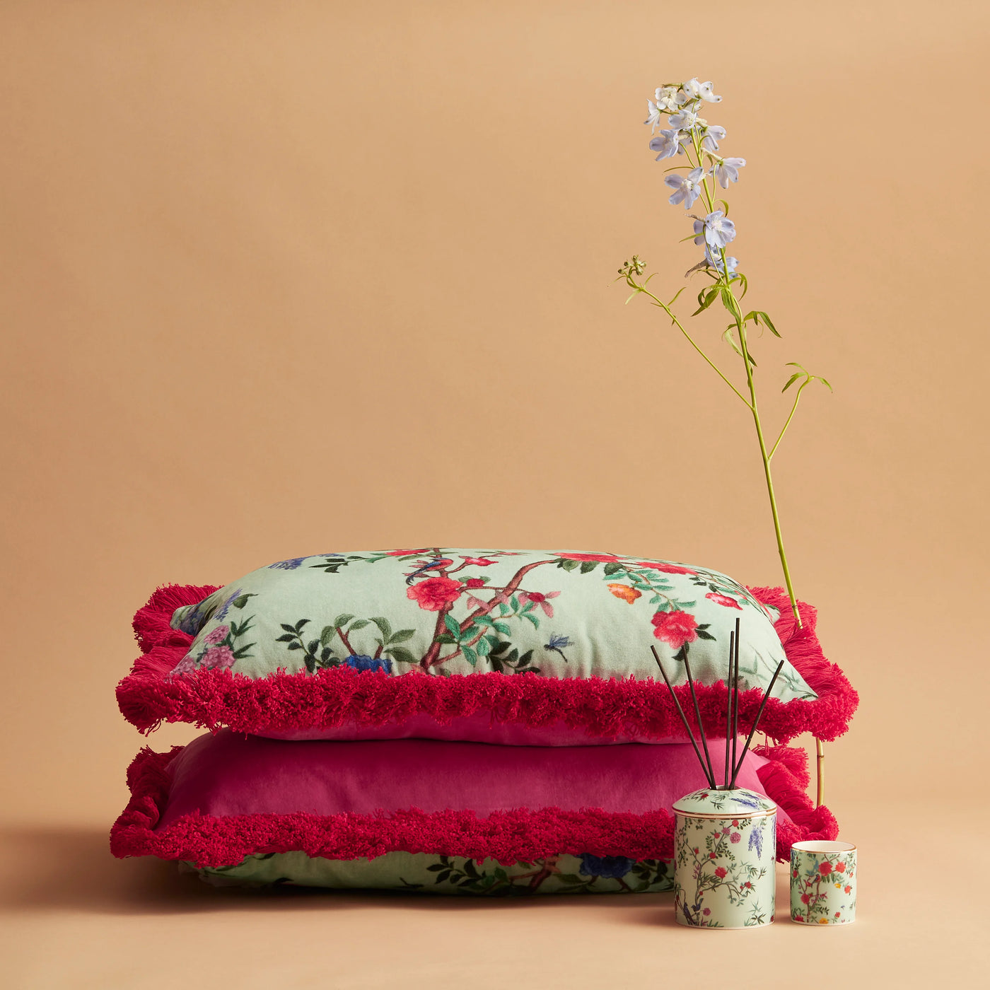 Maison Splendid oblong printed cushions and matching print travel candle and diffuser